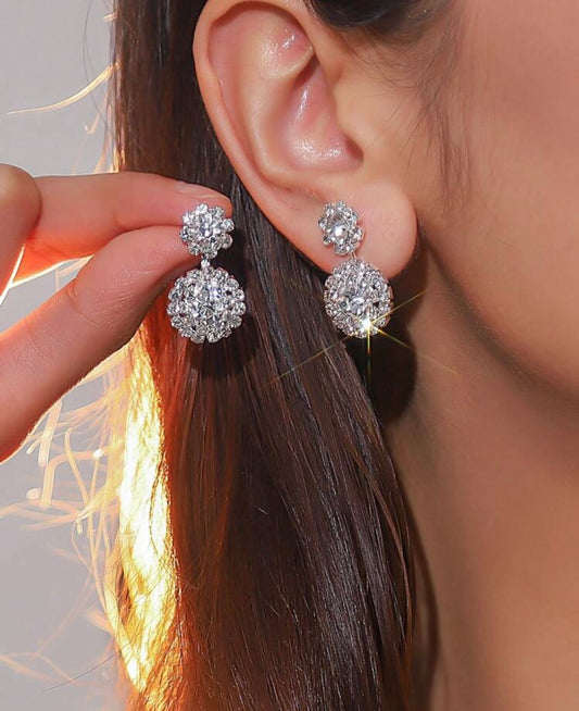 Two Round Silver Shiny Earrings